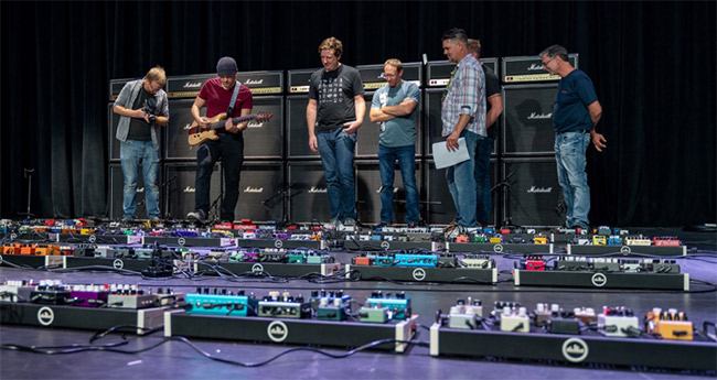 Designers and Rob Scallon admiring their handiwork at the World's Largest Pedalboard