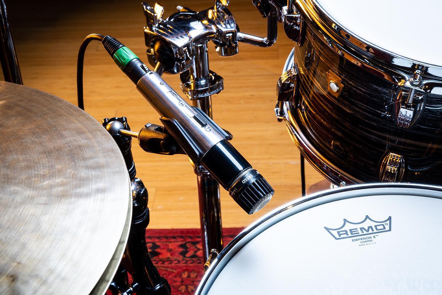 Percussion microphone clearance