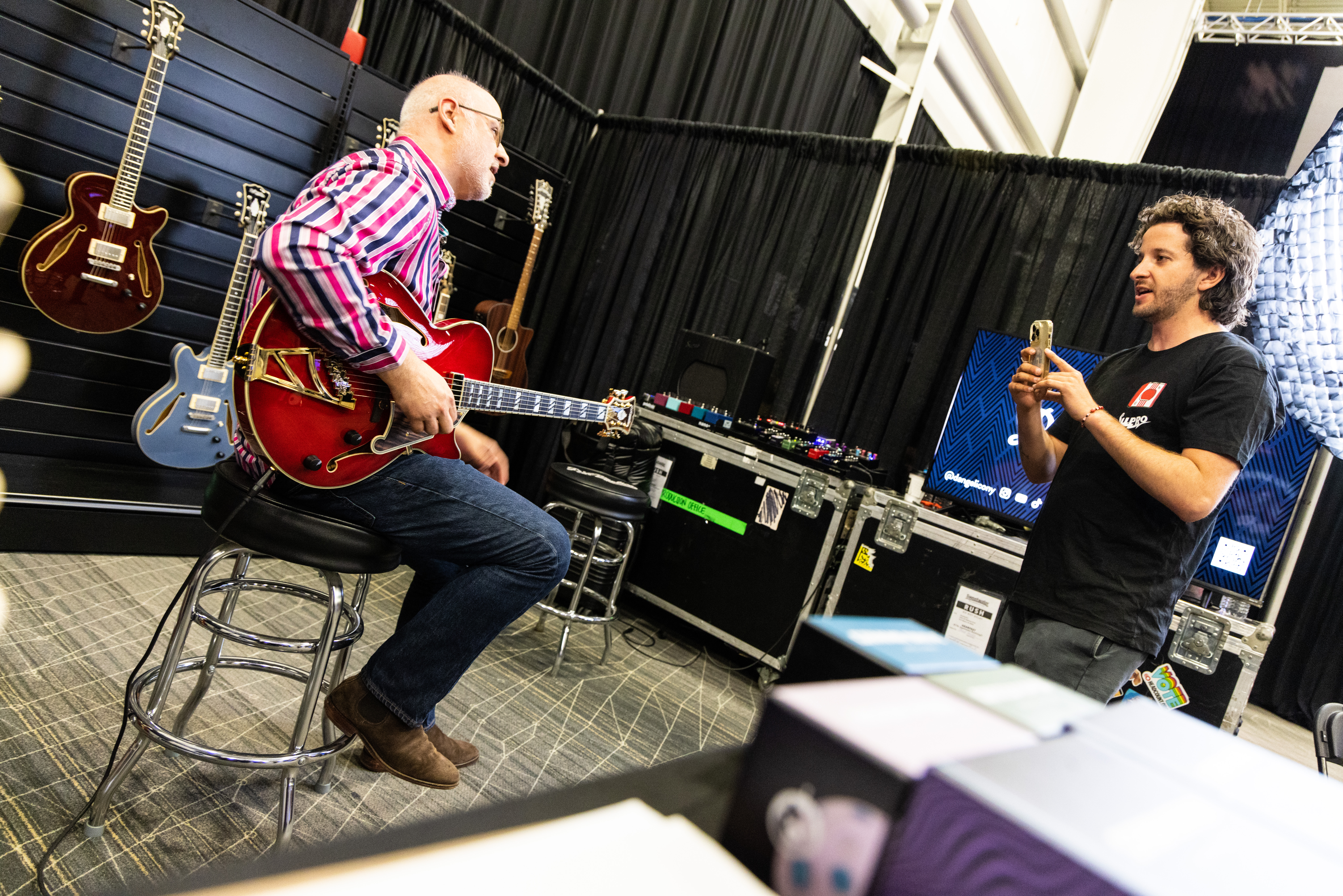 Sweetwater Sales Engineer David Mikautadze snaps one from the 'Gram at the GearFest 2023 Supro Booth