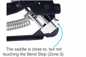 Arrow pointing to where the saddle is close to, but not touching the Bend Stop (Zone 3).